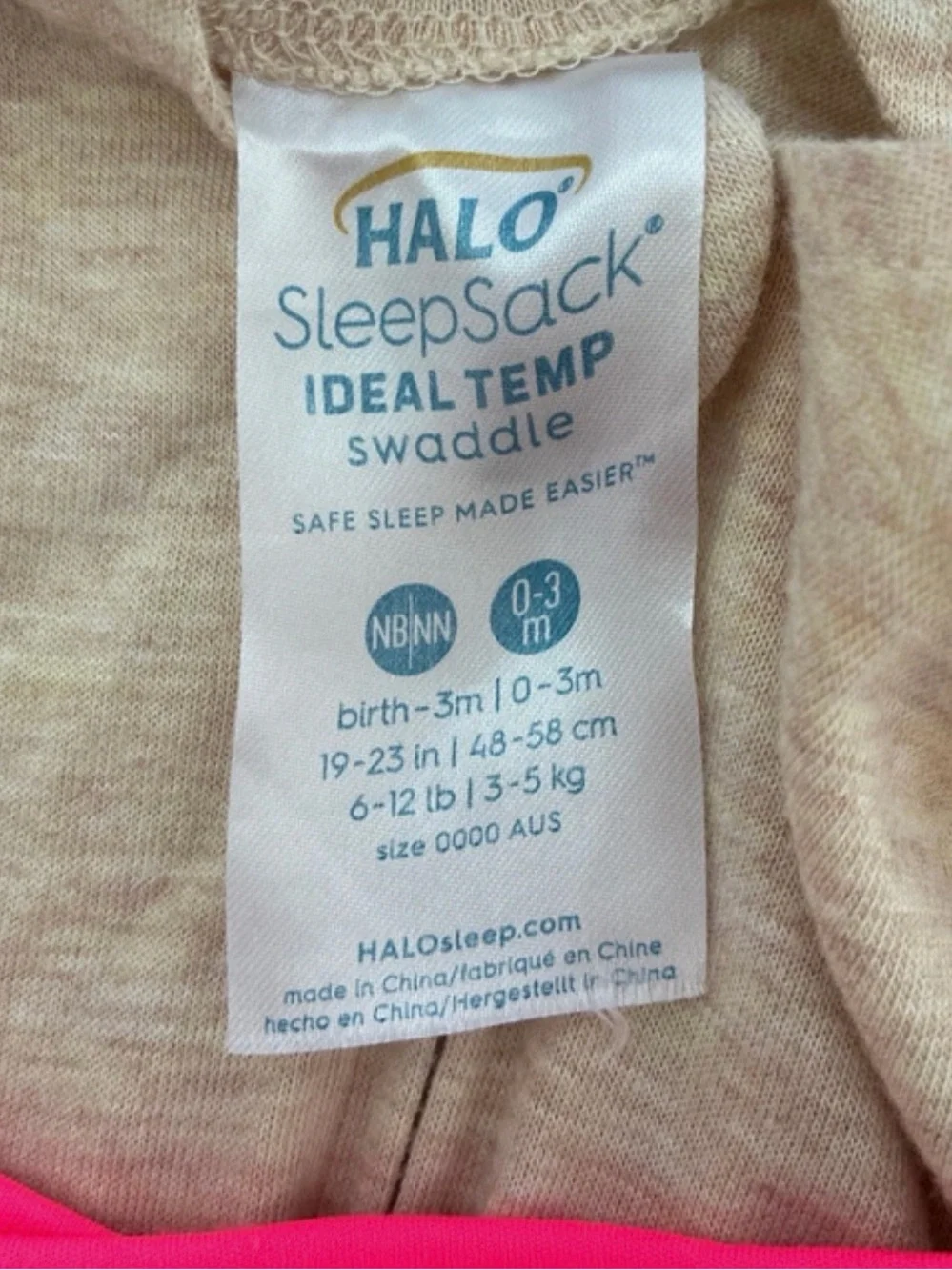 HALO SleepSack Swaddle in Heather Cream with Pink Trim